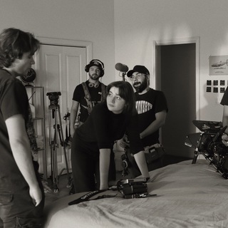 a lady behind the lens